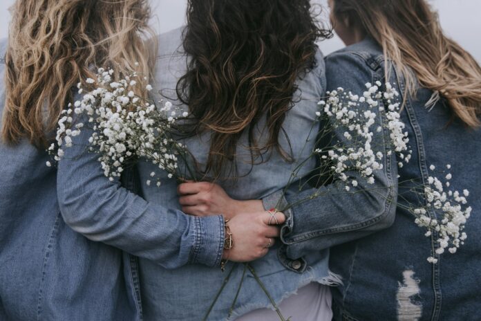 Photo by Becca Tapert group of women facing backward