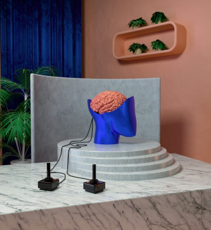Photo by Mo a blue sculpture with a brain on top of it
